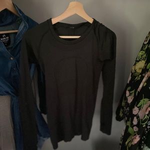 Size 4 run swiftly black T